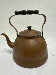 Vintage Copper Tea Kettle With A Wooden Handle.