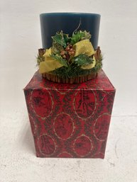 Christmas Candle Centerpiece Featuring A Green Pillar Candle And A Decorative Candle Ring. The Candle Ring Is