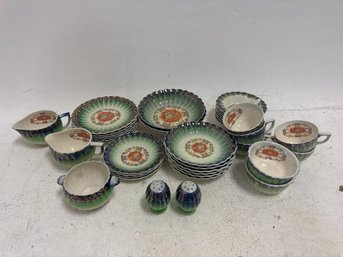 Collection Features Vintage Leigh Ware China, Known For Its Distinctive Green Rim And Floral Pattern, Often Ac