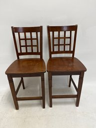 Pair Of Brown Wooden Counter-height Stools With Slatted Backs.