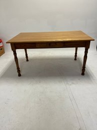 An Oak Writing Desk With Turned Legs And A Single Drawer, Possibly From The Ashton Collection.