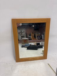 Rectangular Wood-framed Wall Mirror.