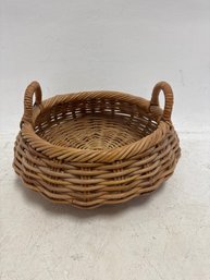 Round, Woven Rattan  Basket With Handles.