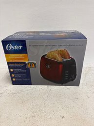 New In Box Oster 2-Slice Toaster In Metallic Red