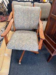 Set Of Four Oak Arm Chairs On Casters