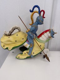 Vintage Ygo Zaccagnini Porcelain Jousting Knight Figurine Featuring Knight In Blue Armor With A Colorful Helme