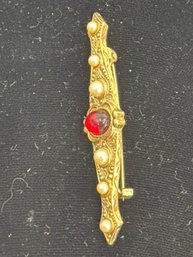 Vintage Victorian Style Bar Brooch Featuring A Central Red Gemstone