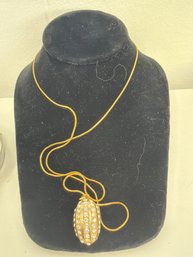 Vintage Gold-tone Fabrege Style  Egg Pendant Necklace Featuring Rhinestone Crystals