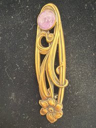 Art Nouveau Style Brooch Pin Featuring A Floral Design And Intricate Scrollwork With Stone Accent