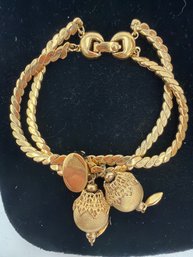 Vintage Monet Gold Plated Lariat Slide Bracelet From The 1960s Featuring A Tasseled Tassel Design