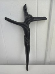 Modernist Or Abstract Crucifix Featuring A Stylized Sculpture Of Jesus Integrated Directly Into The Cross