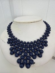 Multi-strand Beaded Statement Necklace Featuring Dark Blue Beads In A Bib Or Collar Style