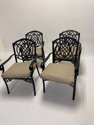 Cast Aluminum Patio Dining Chairs In A Black Finish With Cushions