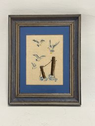 A Framed Mixed-media Or Watercolor Artwork Featuring Coastal Shorebirds, Specifically Seagulls, Near Old Woode