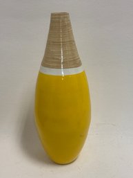 Decorative  Vase Featuring A Yellow Glossy Finish On The Bottom, A Natural Wood-grain Look Neck, And A