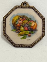 Vintage Artini Sculptured Engraving Wall Plaque Featuring A Fruit Basket Design.