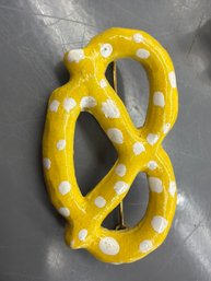 Vintage Bachman Pretzel Shaped Figurative Brass Advertising Pin