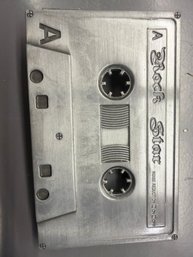 'rock Star' Cassette Tape-shaped Belt Buckle In A Brushed Silver Tone Metal