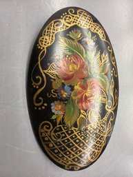 Vintage Russian Hand-painted Lacquered Wooden Brooch Featuring A Floral Designs And Gold Accents