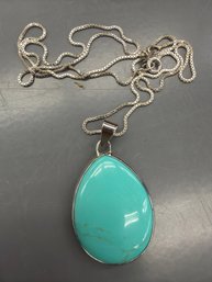 Sterling Silver Teardrop Turquoise Pendant Likely Features A Turquoise Stone In A Bezel Setting