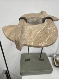 Abstract Stone Sculpture Mounted On A Stand