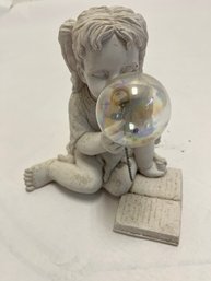 Decorative Cherub Or Angel Figurine, Blowing A Bubble  Made Of Polyresin