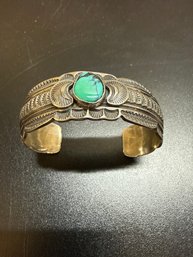 Handcrafted Sterling Silver Cuff Bracelet Featuring A Turquoise Stone