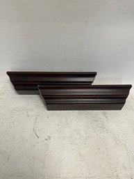 Brown Shelves With Crown Molding Design