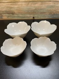 White Porcelain Bowls Feature A Scalloped, Petal-shaped Design Resembling A Blooming Lotus Flower