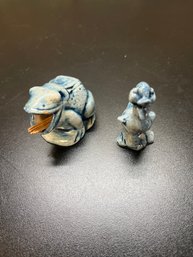 Small Ceramic Figurines, Likely Delft Blue Themed, Including A Frog And A Bird