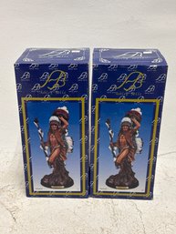 Pair Of Ashley Belle Resin Statues Depicting Native American Figures In Traditional Attire, Which Are Categori