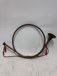 Vintage Brass Hunting Horn, Often Used For Decorative Purposes Or As A Collectible Musical Instrument.