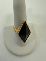 A Kite-shaped Black Onyx Ring, Often Styled After Art Deco Designs From The 1920s