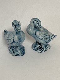 Vintage-style Blue Glazed Ceramic Duck Figurines, Likely Classified As Collectible Pottery.