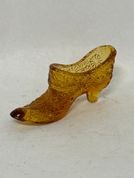 Fenton Art Glass Shoe Figurine In An Amber Color, Featuring The 'Daisy And Button' Pattern.