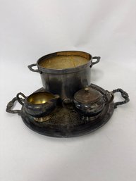 Vintage, Silver-plated Tea Set That Likely Includes A Tray, Creamer, And Sugar Bowl.