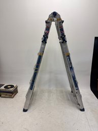 Werner Multi-Position Pro Ladder, Specifically A Telescoping Aluminum Model Designed For Versatility And Profe