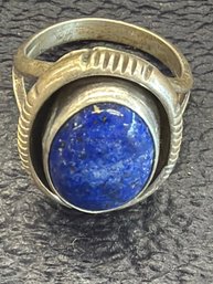 Vintage Sterling Silver Ring Featuring A Lapis Lazuli Stone With A Patterened Band