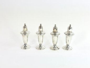 Four Sterling Silver Weighted Salt And Pepper Shakers