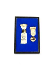 Two 1905 Womens Military Badges