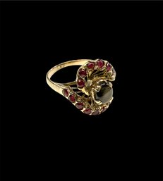 14 Karat Gold Ring With Black Sapphire And Rubys