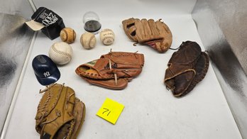 Vintage Baseball Gloves And Baseballs.