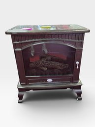 Dimplex Dark Brown Electric Stove Fireplace With Faux Logs, Fluted Arch, And Cabriole Feet. L 19½ × W 14½ × H