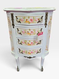 White Painted Bombe Chest With Hand-painted Florals, Four Drawers, And Gilt Mounts. L 17½ × W 21½ × H 30⅜ In.