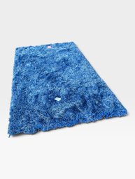 Bright Blue High-pile Shag Area Rug. 5' × 7'.
