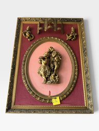 Gilt Cherub Wall Plaque, Oval Relief Of Two Children, Burgundy Mat, 38½ × 47½ In.