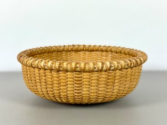 A Nantucket Woven Basket - Signed LMR On Bottom