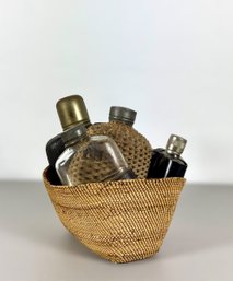 Grouping Of (4) Antique Flasks & Woven Basket
