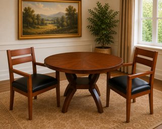 Round Table And Two Matching Chairs