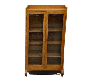 Oak Cabinet With Glass Panel Doors